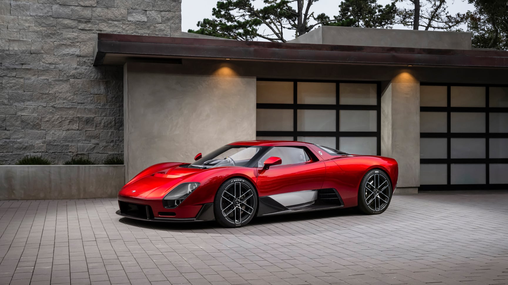 McLaren McL 6GT concept in red, exterior at the Monterey presentation